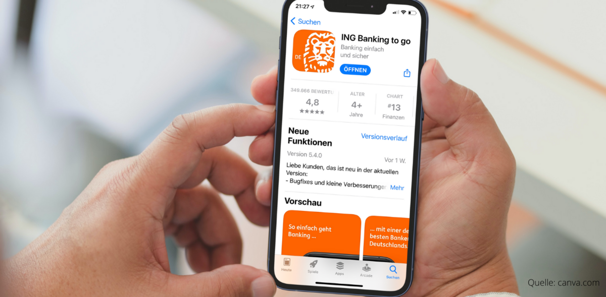 A person holding a phone showing the ING Banking to go app in the App Store