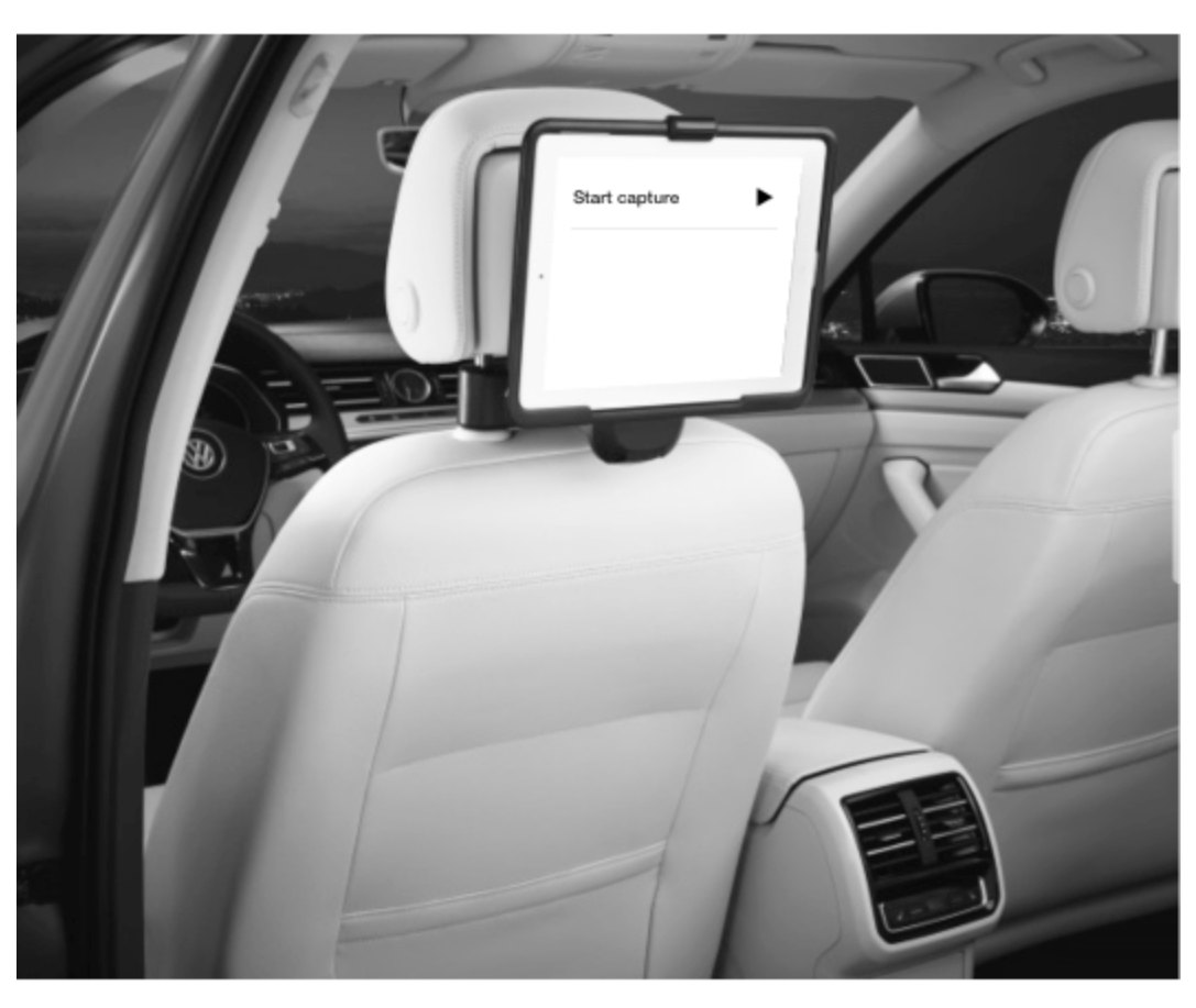 Tablet mounted in a car showing the “Start capture” prototype during a test drive